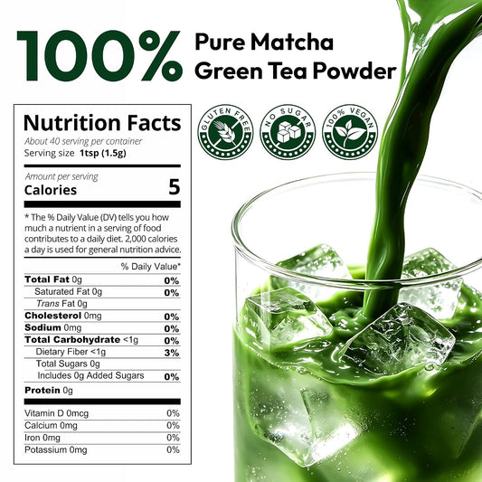 Emerail matcha canister with glass cup and pouring stream of vibrant green matcha