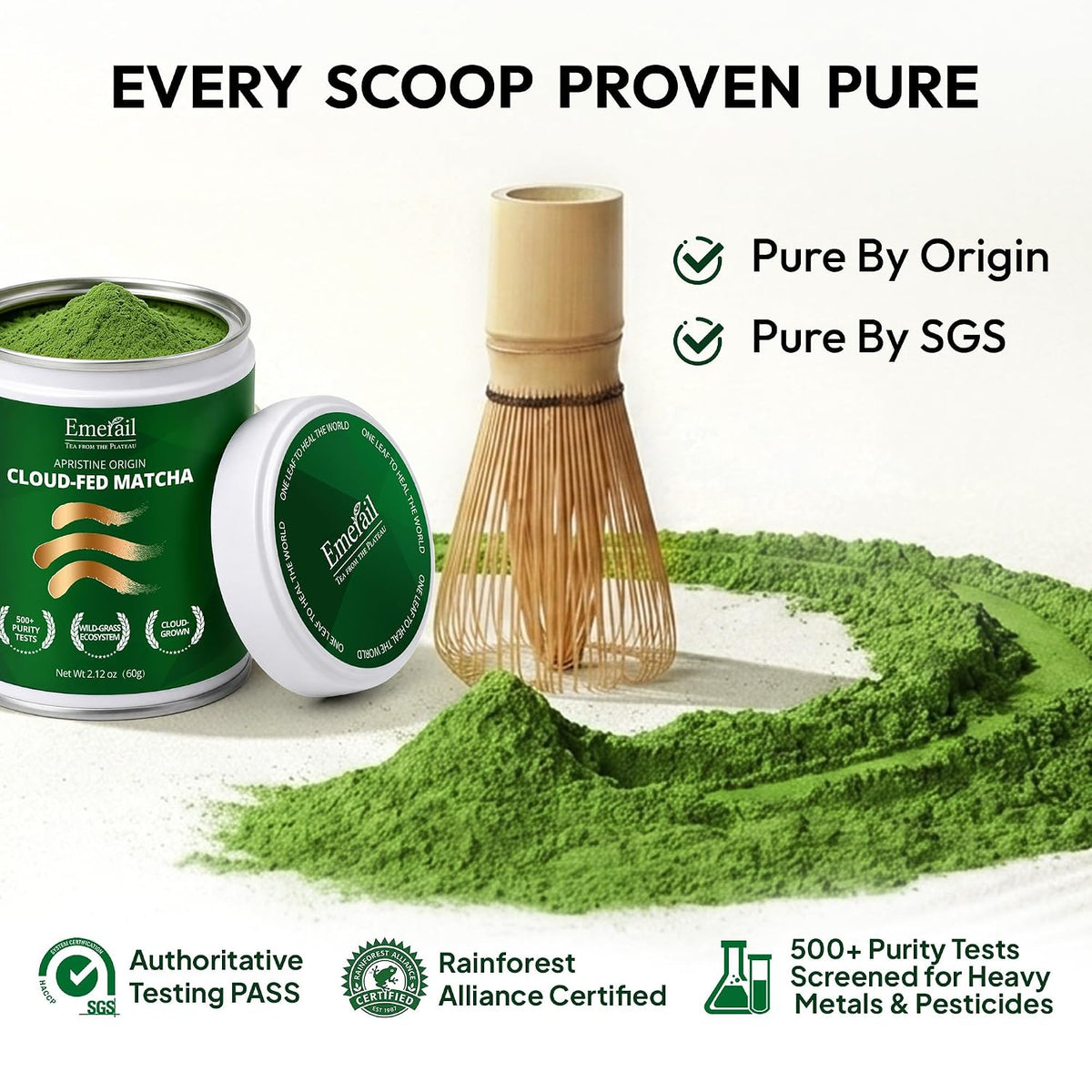 Emerail cloud-fed matcha tins with green powder mound and small whisk tool